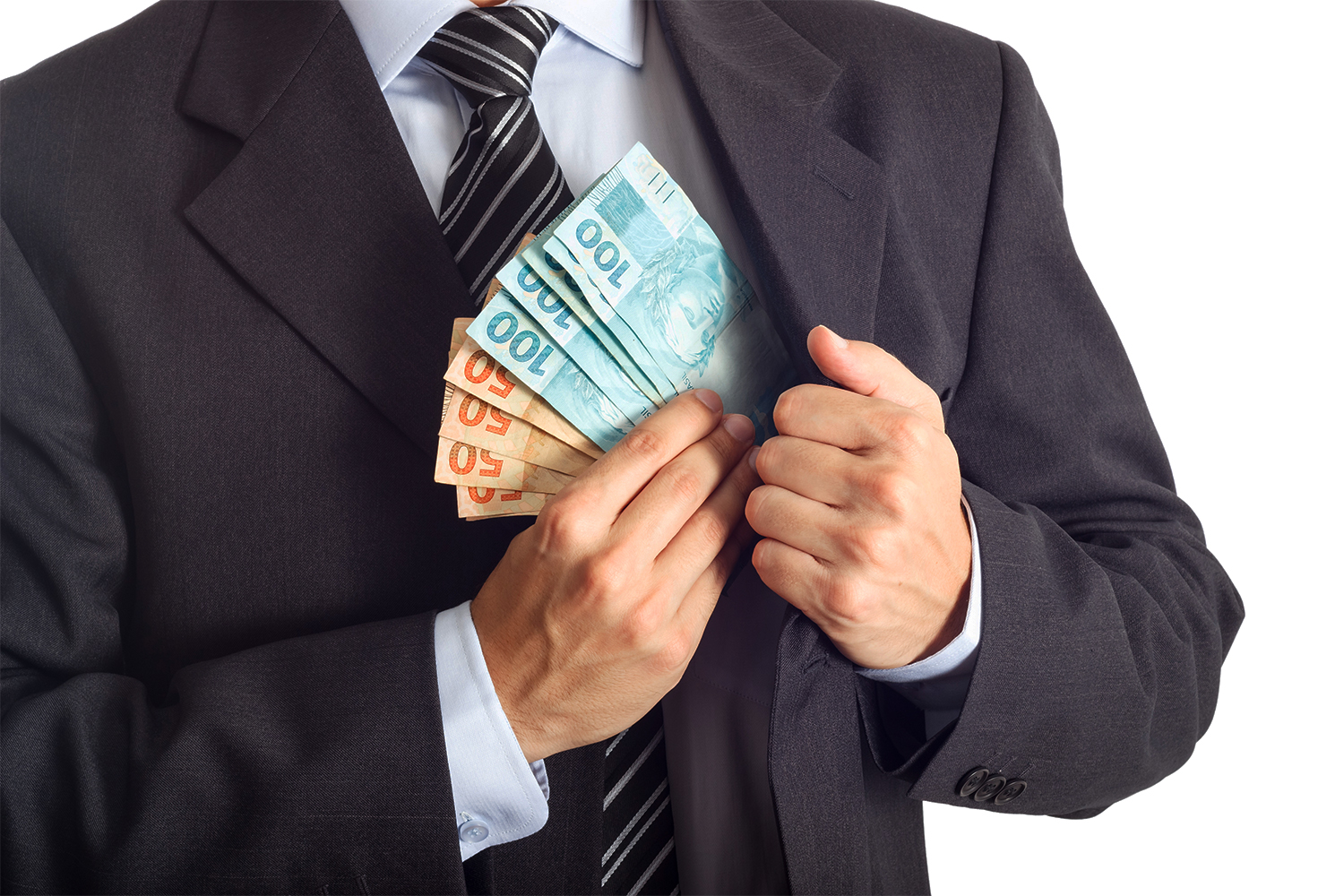 Businessman in a suit putting money in his pocket isolated on white background